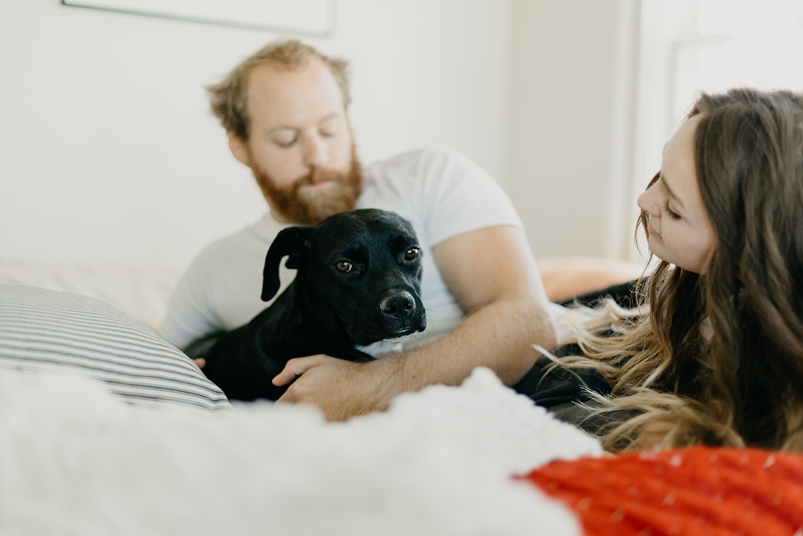 cuddly in-home couple photos with puppy phoenix arizona samantha patri photography