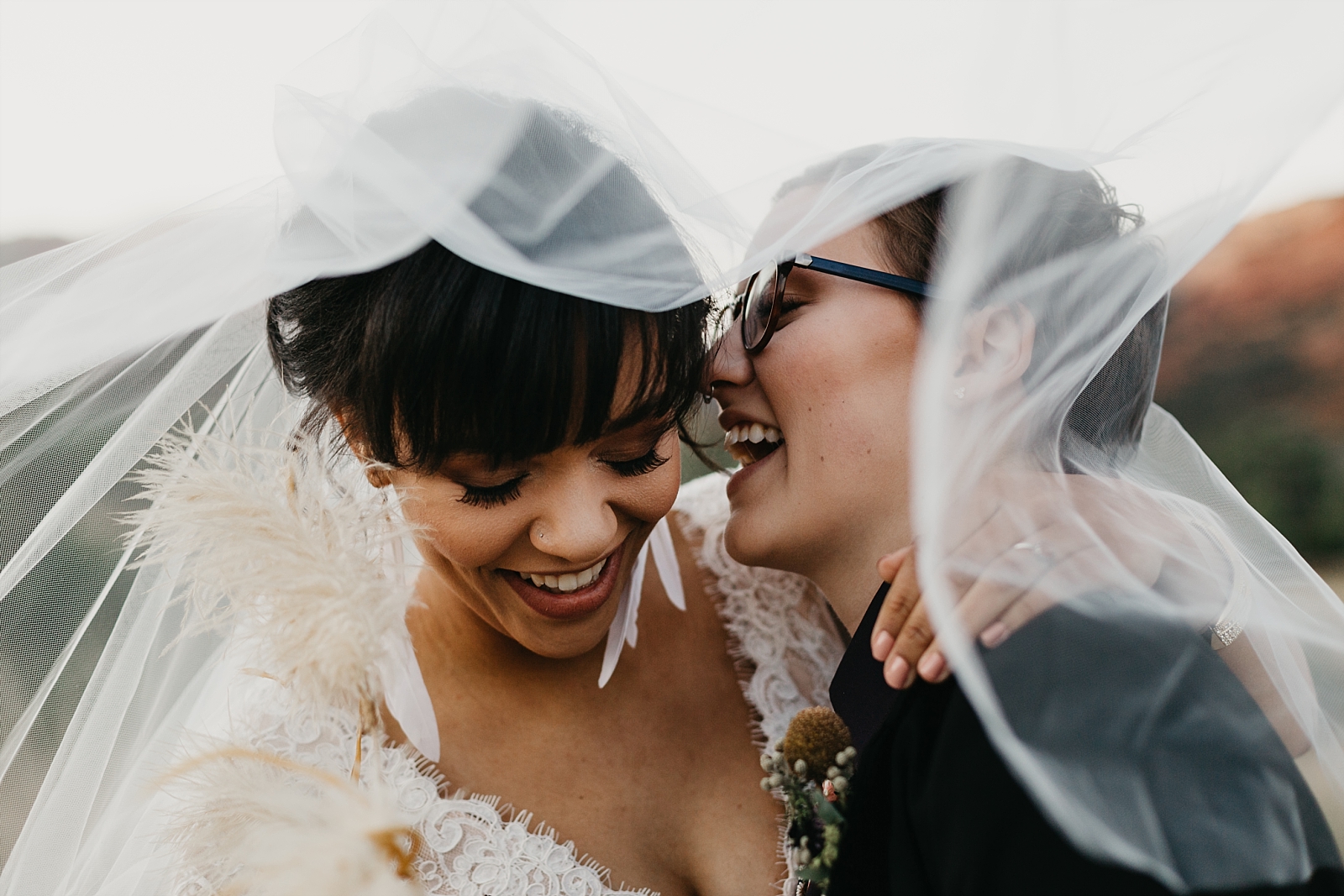 Sedona Arizona red rocks LGBTQ styled elopement lesbian wedding under the veil photo Samantha Patri Photography