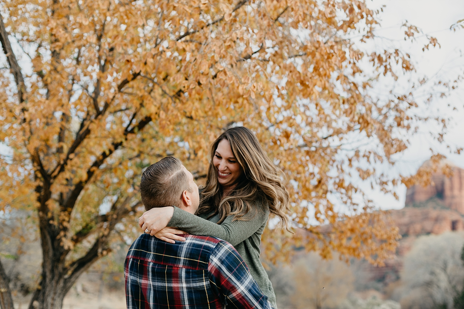 Playful fall leaves Sedona engagement photography Red Rock Crossing Crescent Moon Ranch Samantha Patri Photography