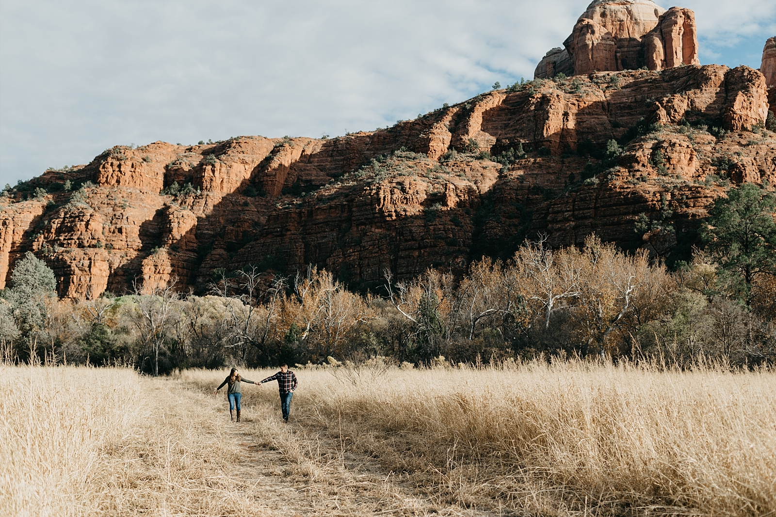 red rocks open field Sedona Arizona engagement session Red Rock Crossing Crescent Moon Ranch Samantha Patri Photography