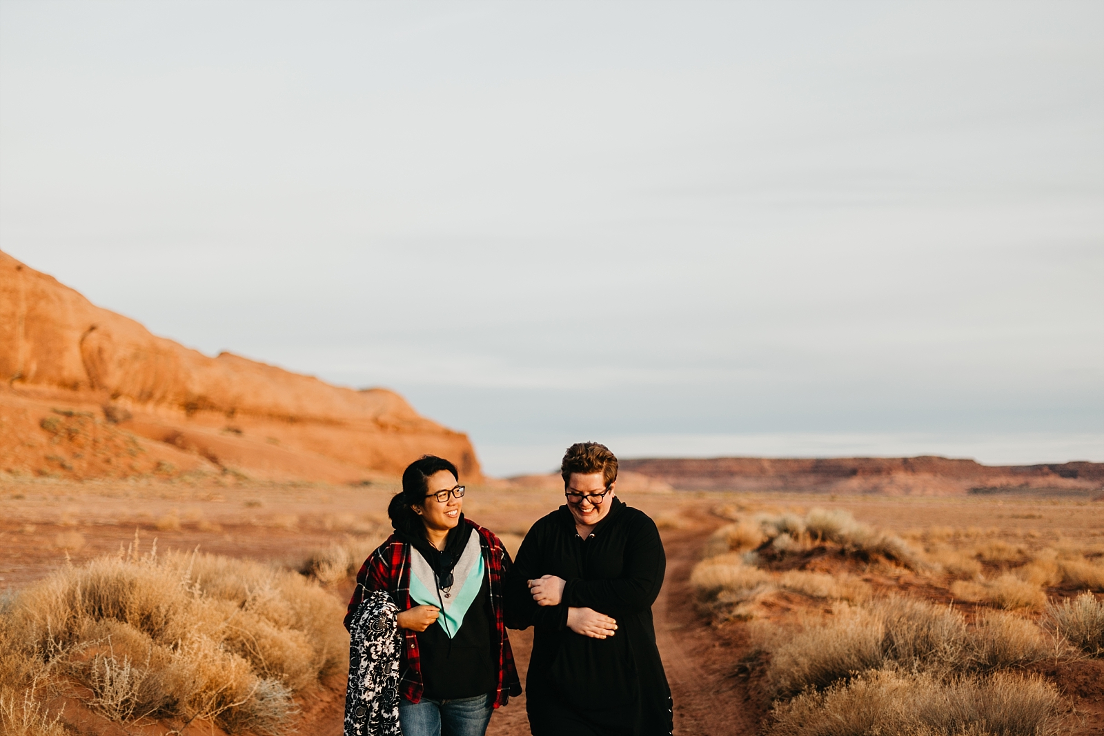LGBTQA desert surprise sunrise proposal engagement in Monument Valley Arizona AZ samantha patri photography