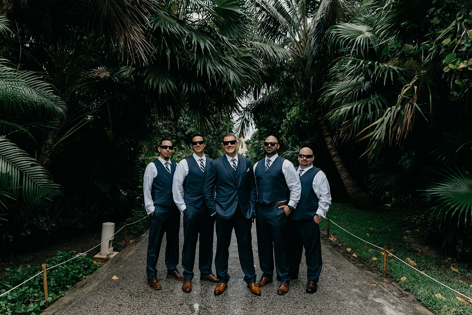 tropical groomsmen portraits dark blue suits sunglasses Now Sapphire Riviera wedding photos Cancun, Mexico Samantha Patri Photography Arizona Wedding Photographer