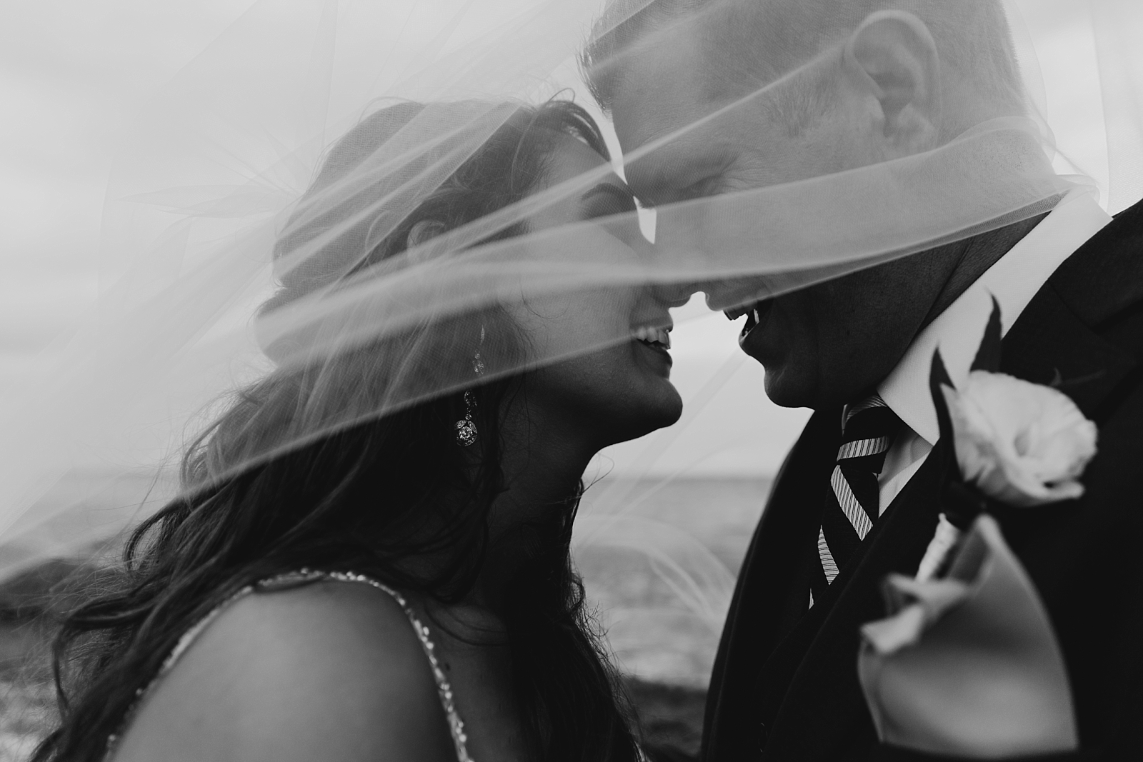 beach natural moody bride and groom portraits Now Sapphire Riviera wedding photos black and white under the veil Cancun, Mexico Samantha Patri Photography Arizona Wedding Photographer