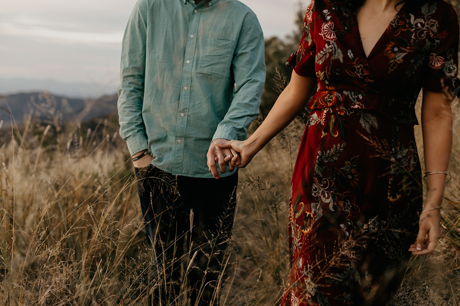 romantic natural sunrise hand holding in tall grass engagement photos Scottsdale az Samantha Patri Photography