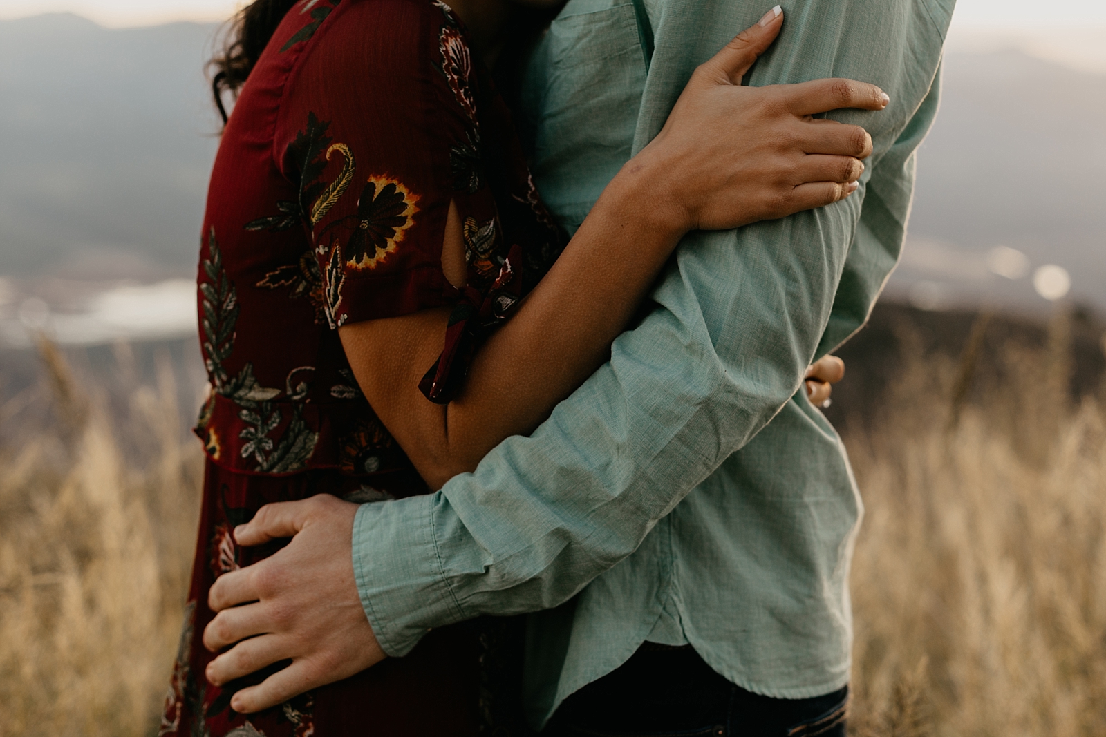 romantic engaged couple cuddling on Humboldt Mountain Scottsdale az Samantha Patri Photography