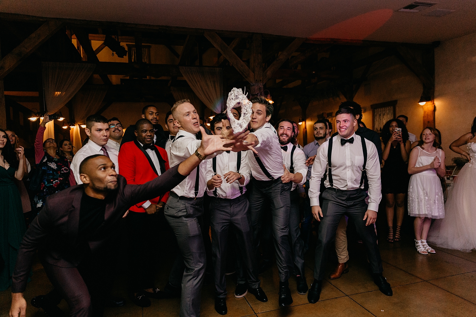 fun reception dancing garter toss Shenandoah Mill wedding photographer Gilbert AZ Arizona Samantha Patri Photography