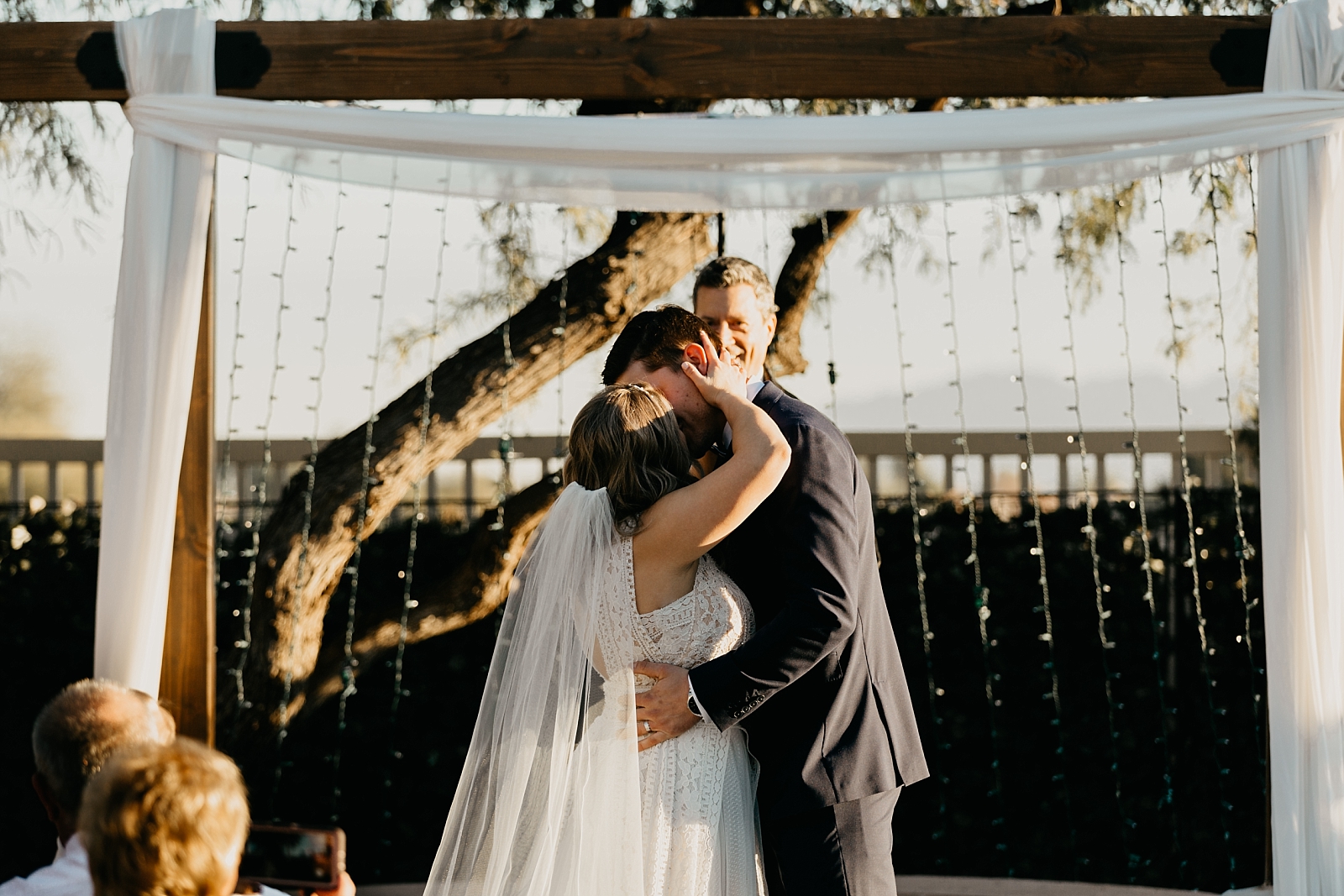 Just married first kiss Palm Valley Golf Club Wedding Goodyear, AZ Samantha Patri Photography
