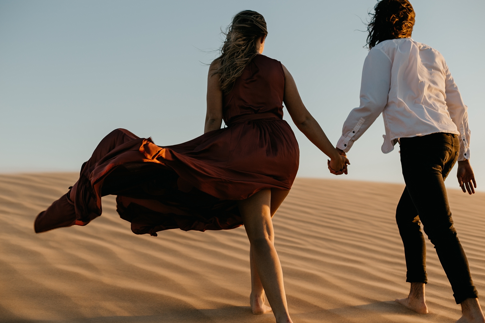 Couple in the sand dunes of Glamis California engagement photographer
