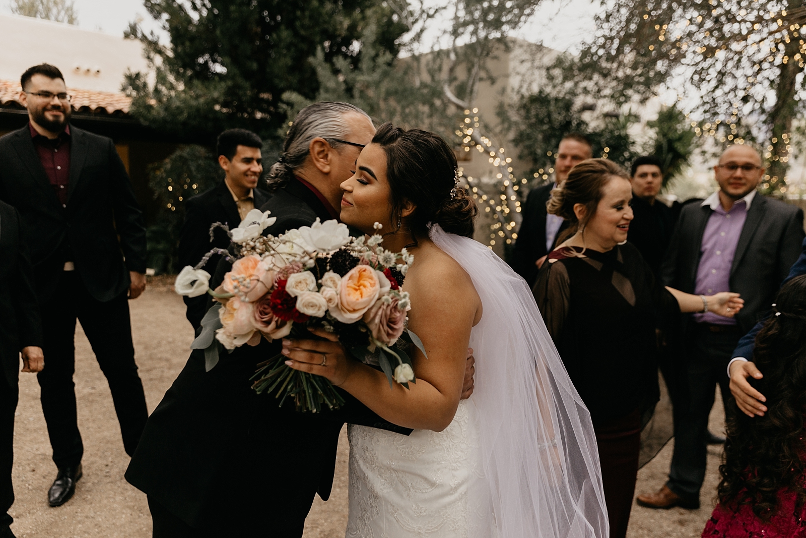 Candid parent hugs Tohono Chul Wedding photos Tucson AZ Photographer
