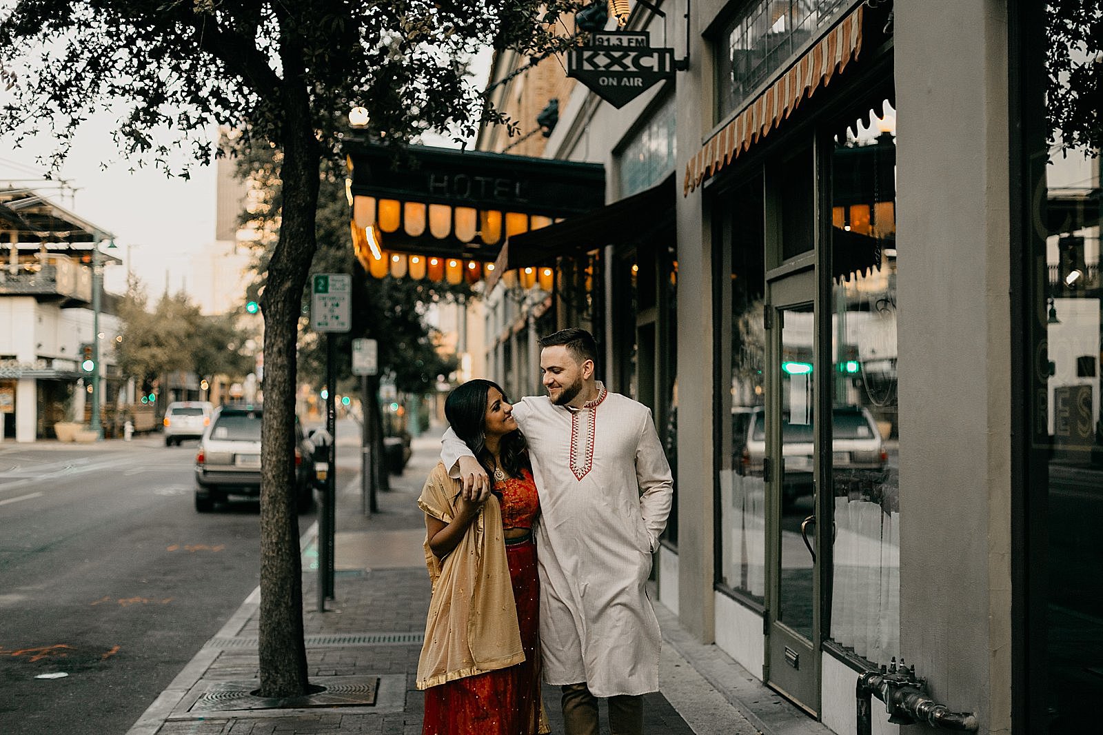 Sunrise downtown tucson AZ engagement photos Indian couple outside hotel congress