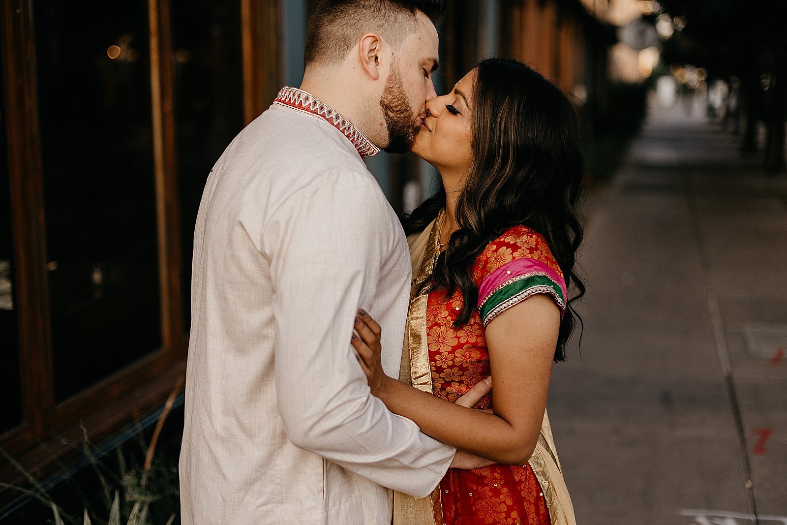 tucson AZ engagement photos Indian couple in tradtitional outfits kissing