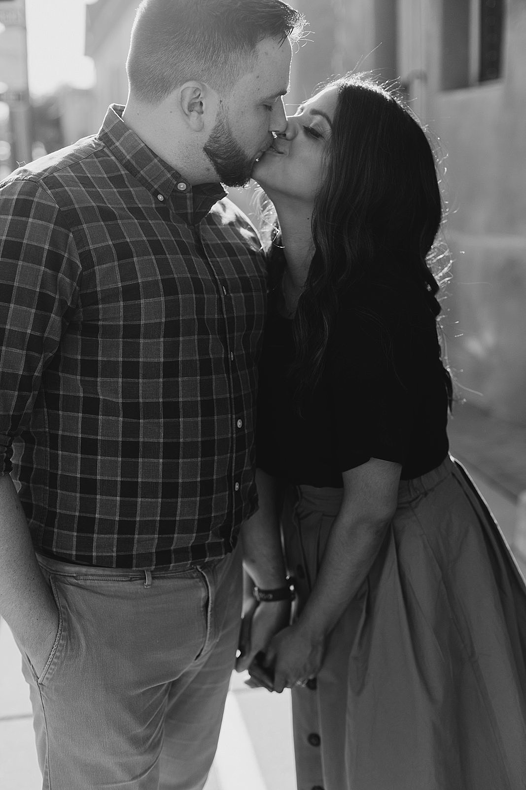 black and white photo of couple kissing in tucson