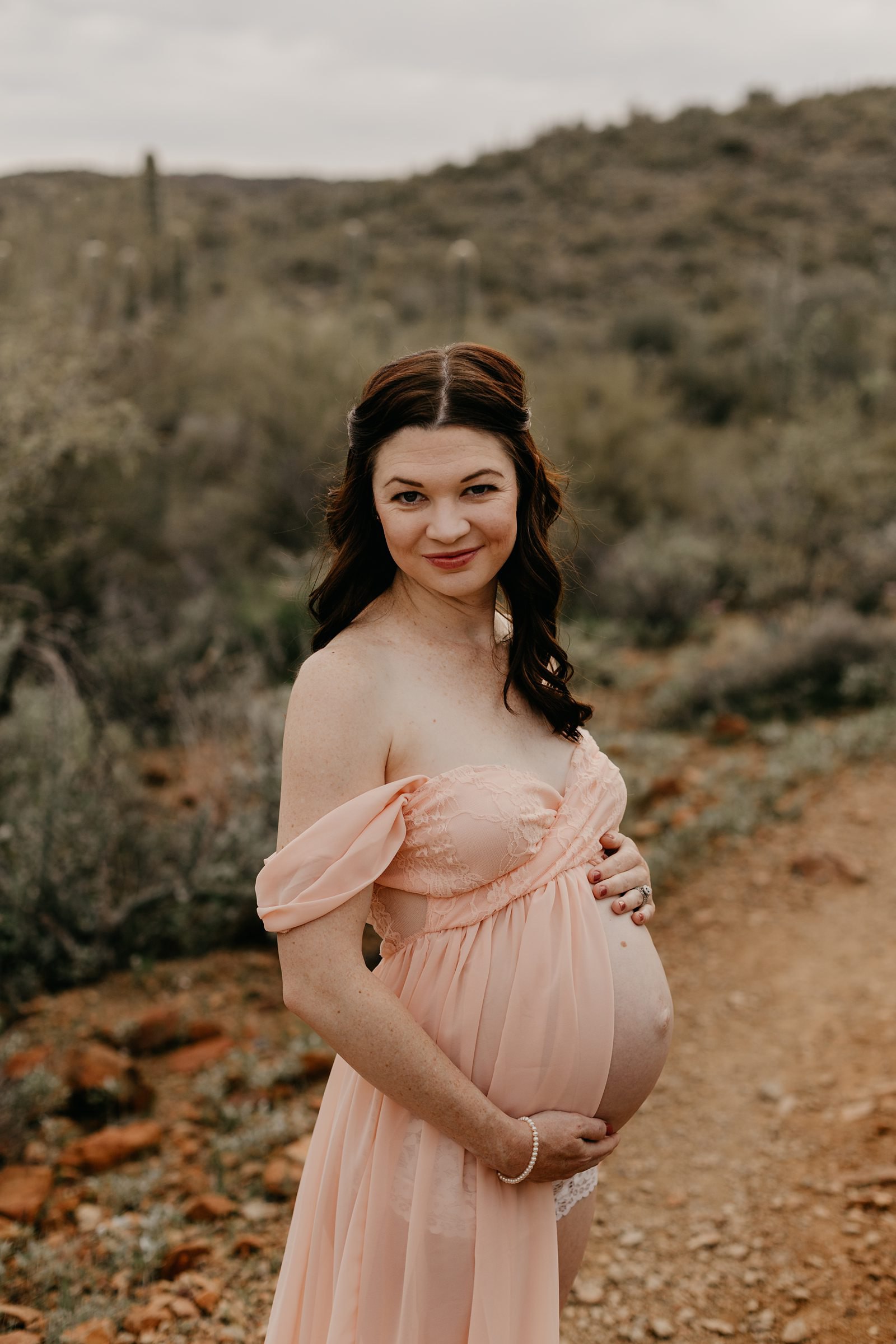 Desert maternity photos phoenix AZ mom in pink dress