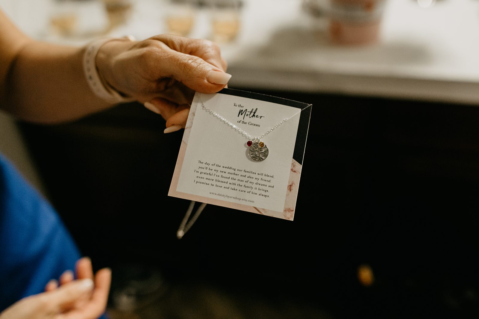 A necklace gift to the mother of the groom from the bride