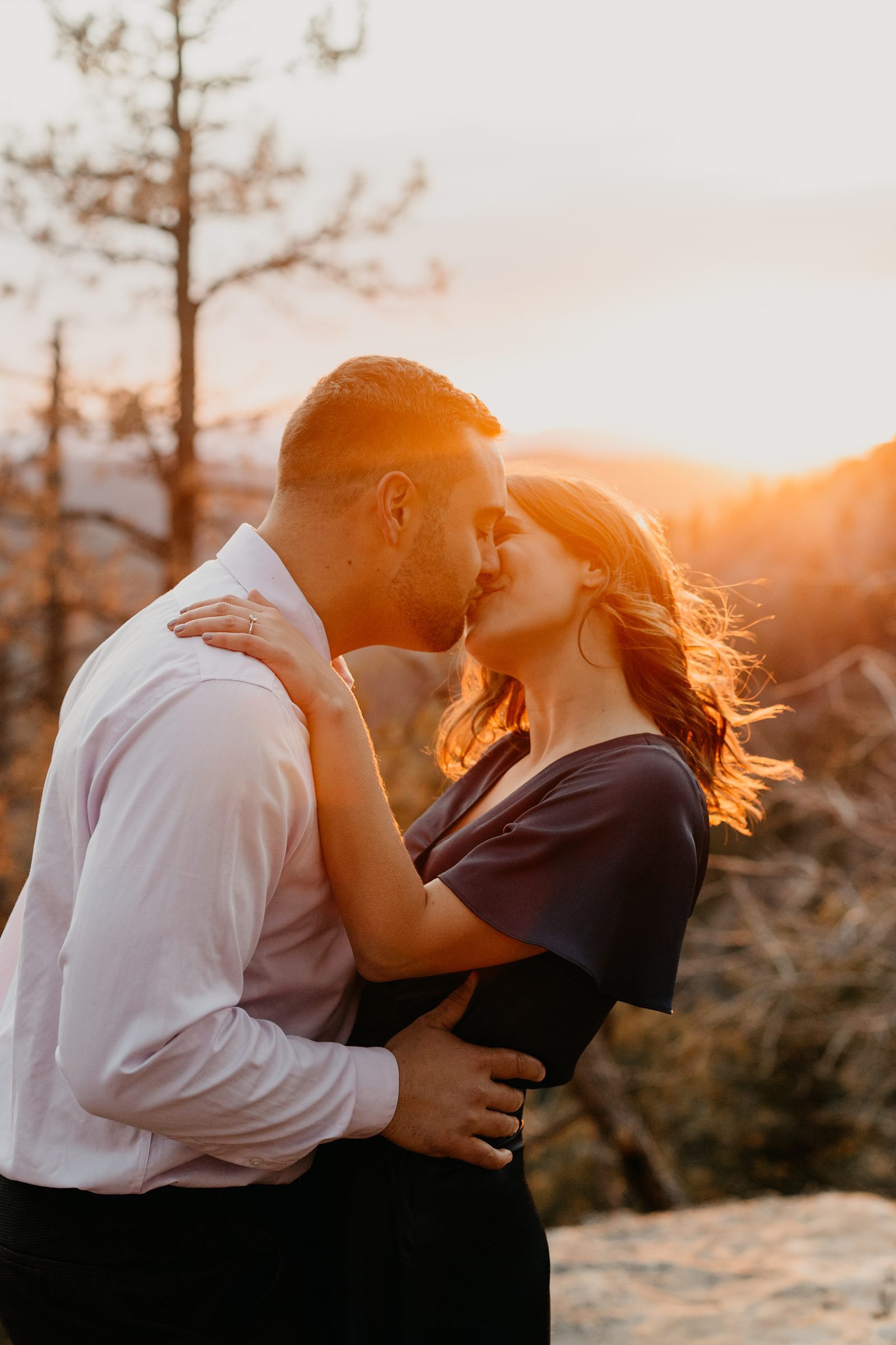 winter Mogollon Rim Engagement Payson, AZ, golden sunset, light couple, kissing