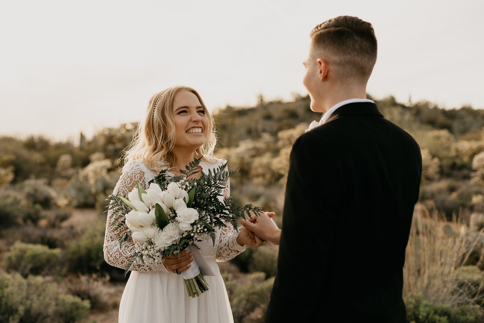 bride and groom frist look during their desert elopement photos in phoenix arizona