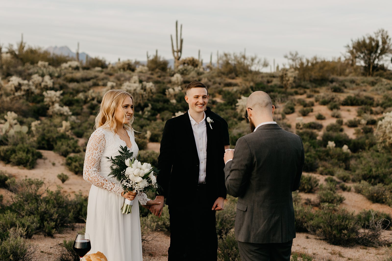 superstition mountain intimate elopement in the phoenix arizona desert bride with boho open back lace dress