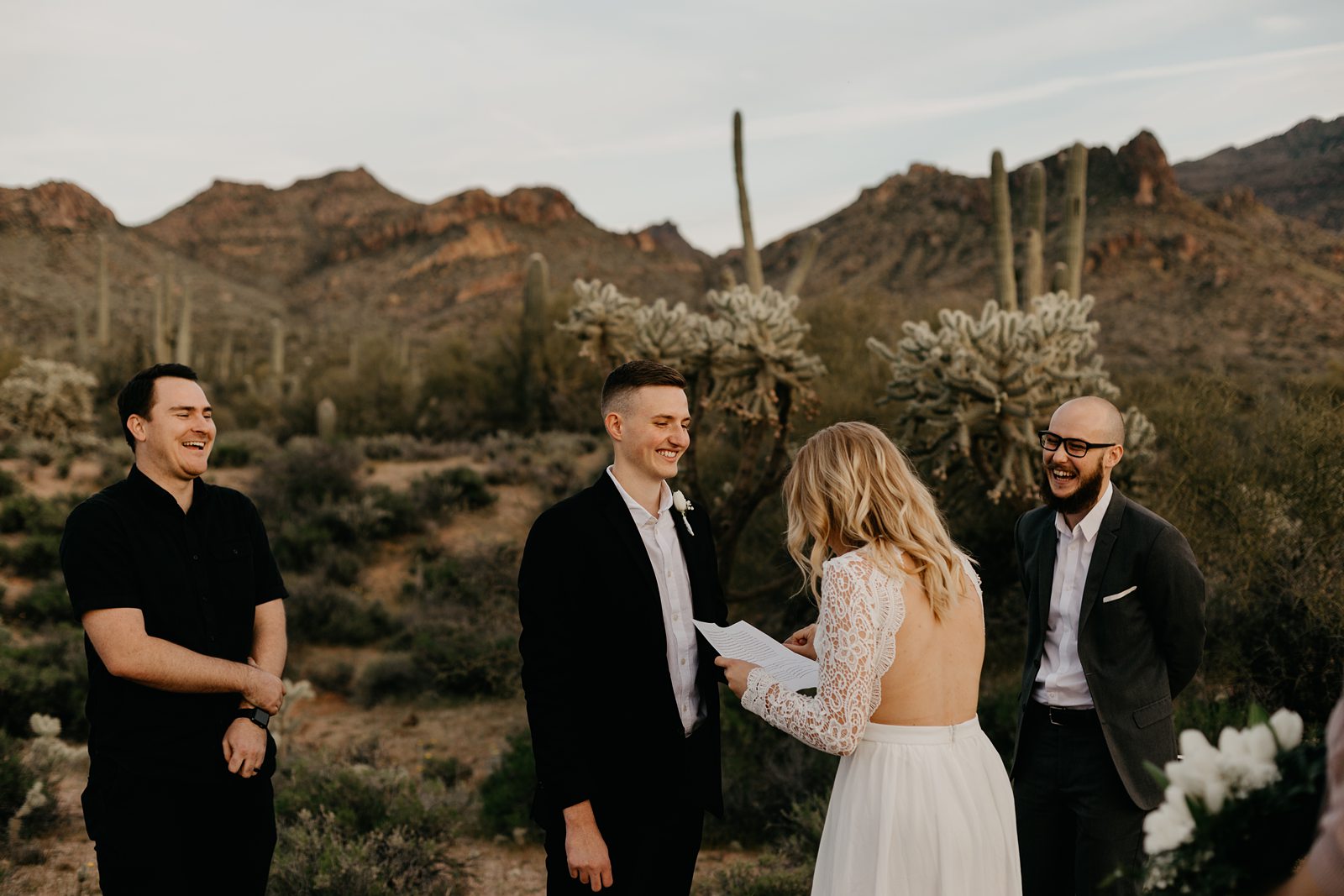 bride and groom exchanging vows in the superstition mountains for their adventurous intimate wedding in the phoenix arizona desert