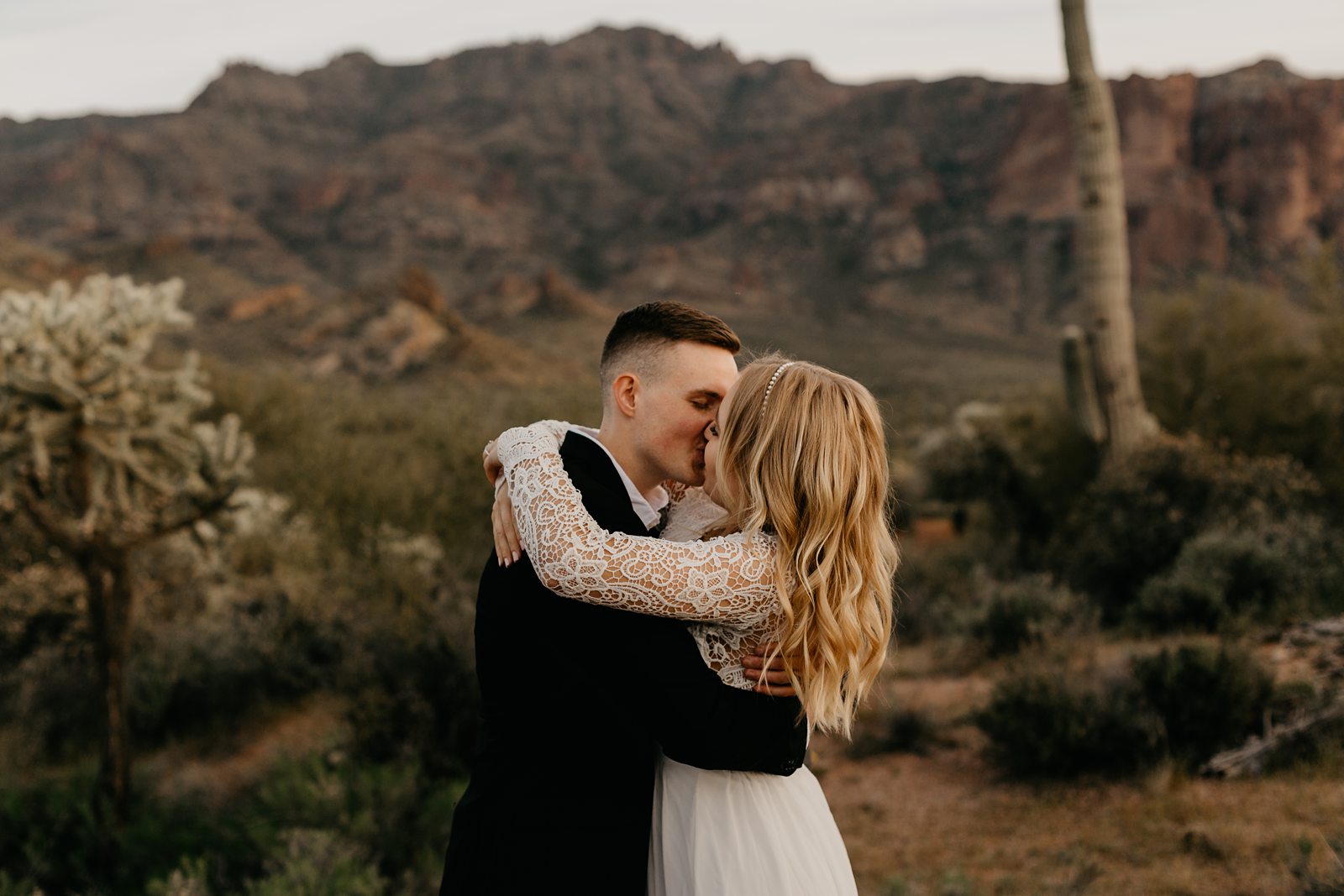 wedding couple kissing at superstition mountain intimate elopement phoenix AZ