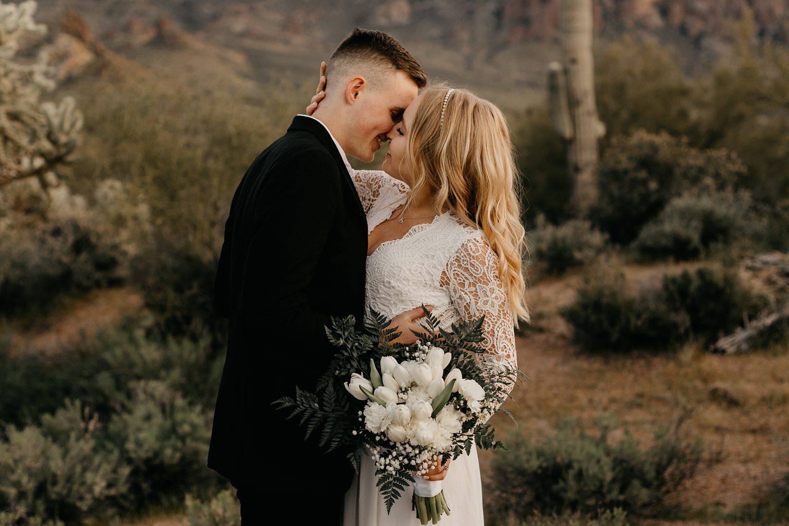 bride and groom kissing at their desert intimate elopement phoenix AZ