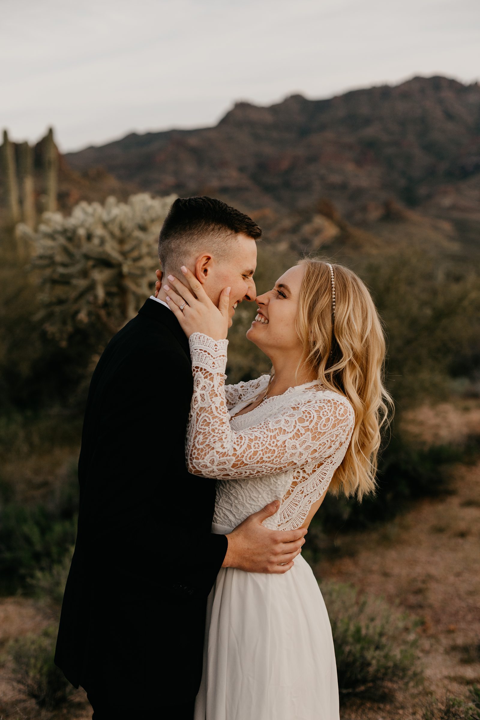 bride and groom laughing wedding portaits in the desert lost dutchman state park apache junction az