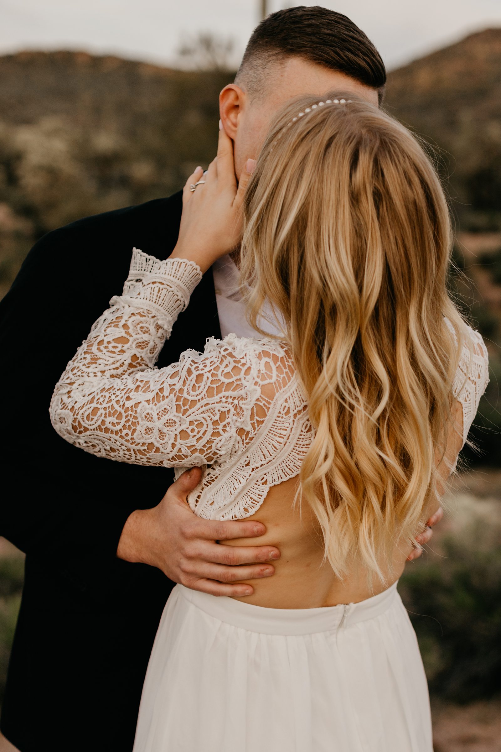 bride wearing boho backless lace wedding dress