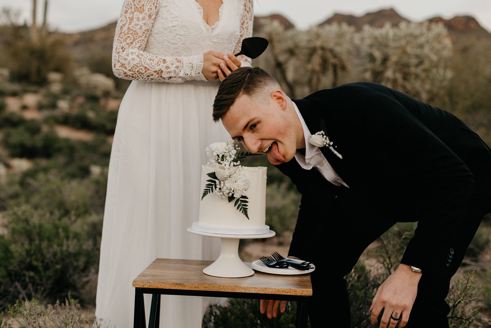 desert elopement cake cutting outside in phoenix arizona