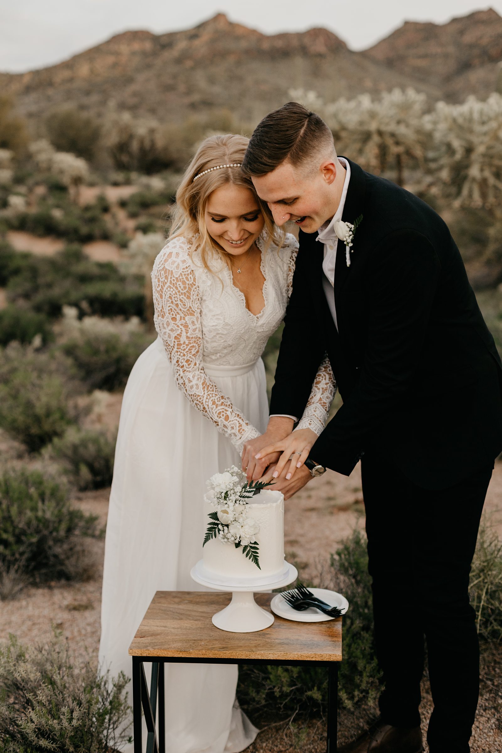 desert elopement cake cutting outside in phoenix arizona