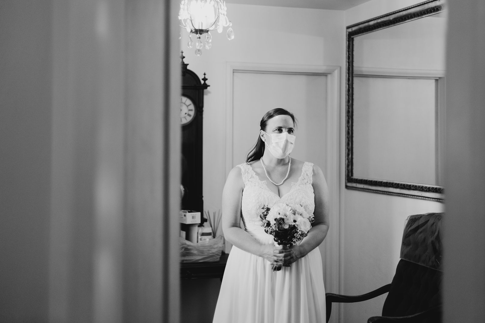 bride wearing a face mask in a chapel in Yuma AZ about to walk down the aisle