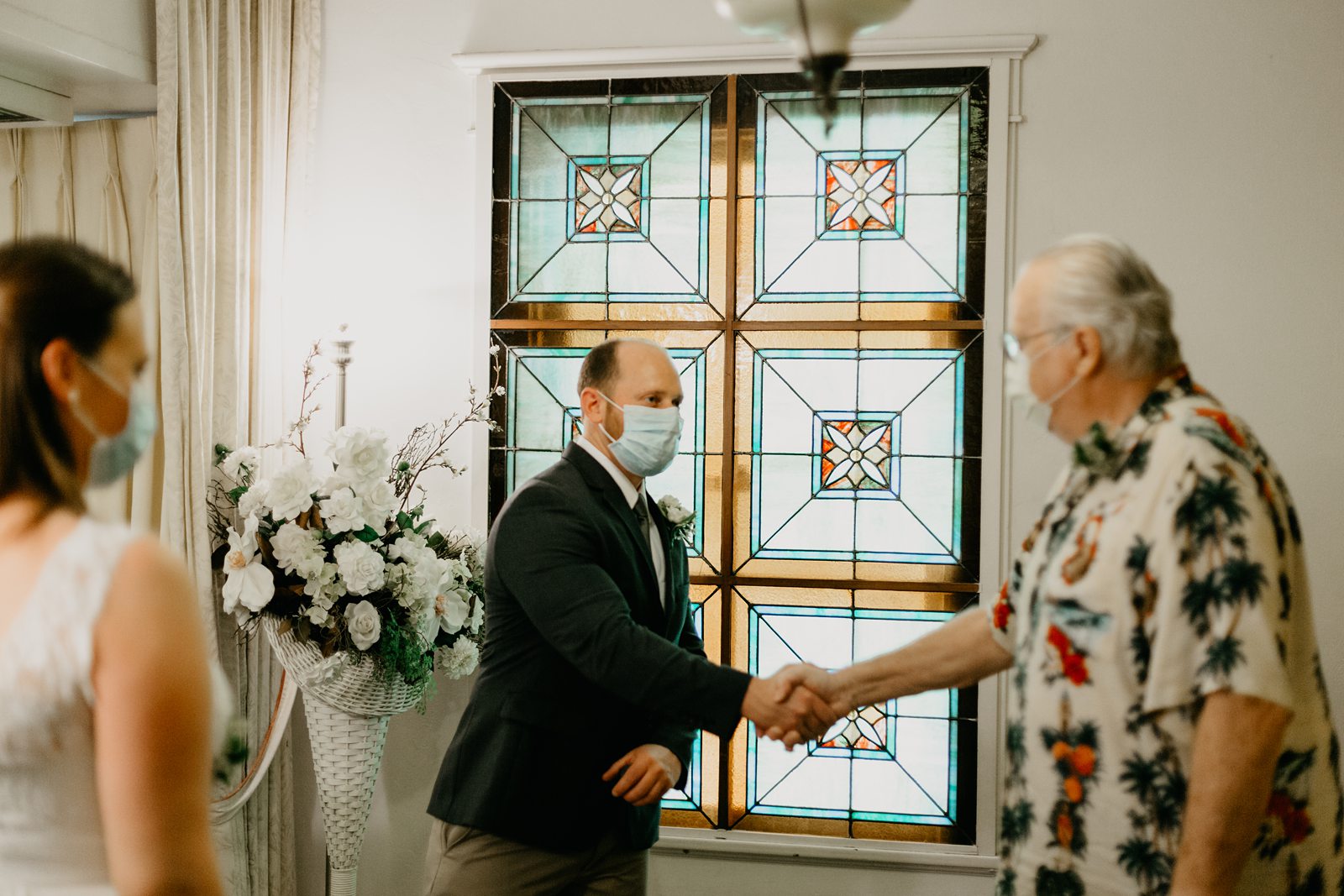 groom shaking bride's father hand at Lutes gretna green wedding chapen in yuma az