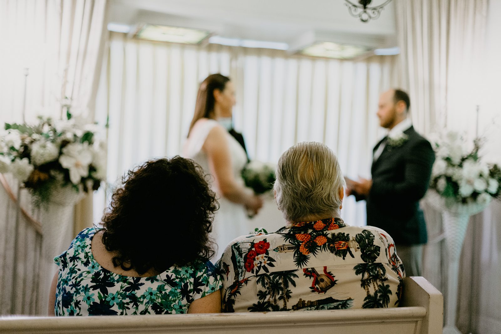 Arizona Yuma elopement photos of ceremony at Lutes Gretna Green wedding chapel parents watching ceremony