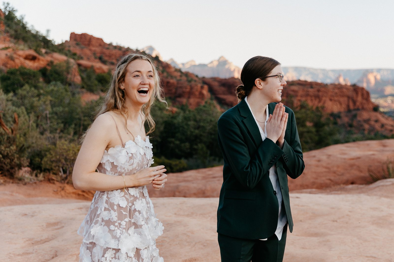 Brides smiling laughing sedona hiking elopement