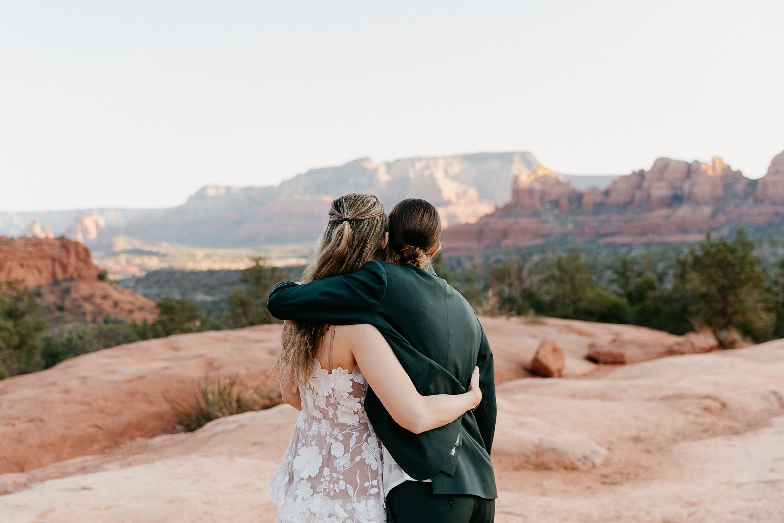 Brides hugging Sedona Elopement